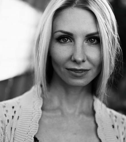 person grayscale photography of woman wearing lace shirt black-and-white