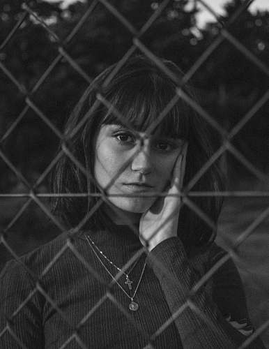 black-and-white greyscale photo of woman face