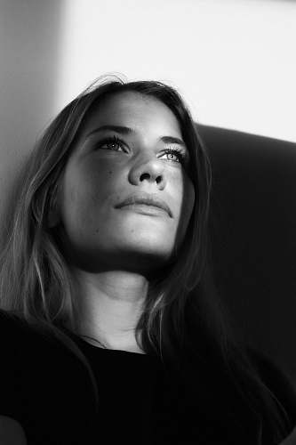 person greyscale photography of woman black-and-white