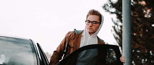 apparel man entering car clothing