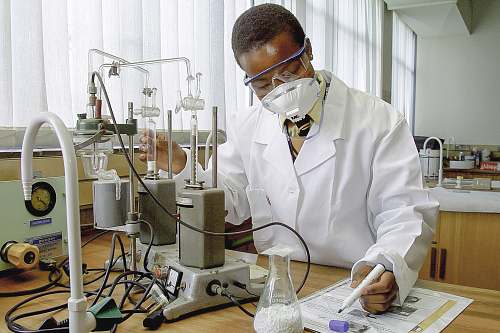 person man inside laboratory experiments and write down the details lab