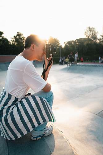 person man takes photo photographer