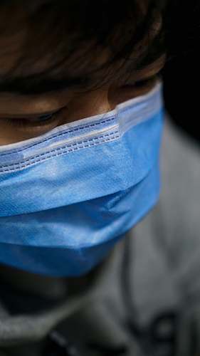 person person in blue and white shirt doctor