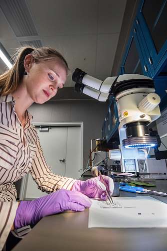 person woman doing experiment in a lab clinic