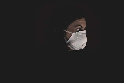 person woman in white face mask doctor
