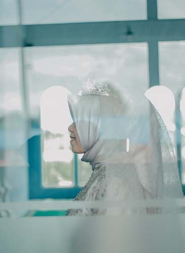 apparel woman wearing hijab headdress clothing
