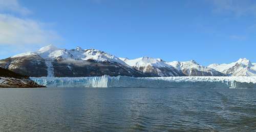 mountain landscape photography of iceberg melting during daytime glacier