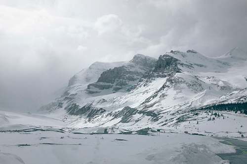 mountain panoramic photography of mountain covered snow grey