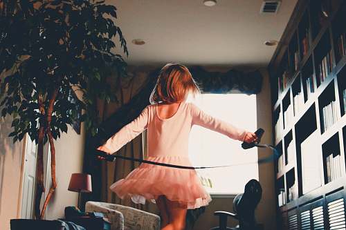 child girl playing jumping rope person