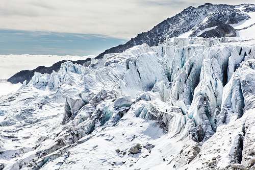 ice mountain covered with snow at daytime glacier