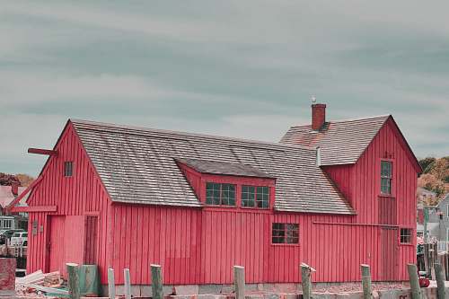 outdoors red wooden shed barn