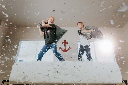 kid two toddler pillow fighting human