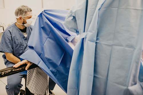 surgeon doctors in operation human