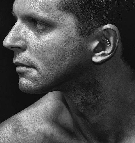 black-and-white grayscale photo of man face