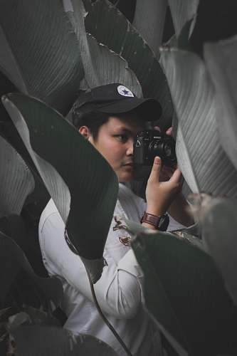 human man in black cap photography