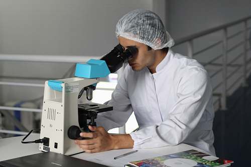 human man sight on white microscope people