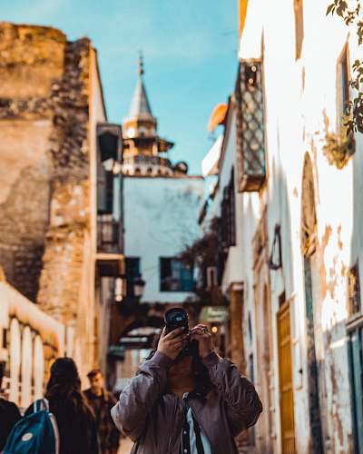 human person taking photo photographer
