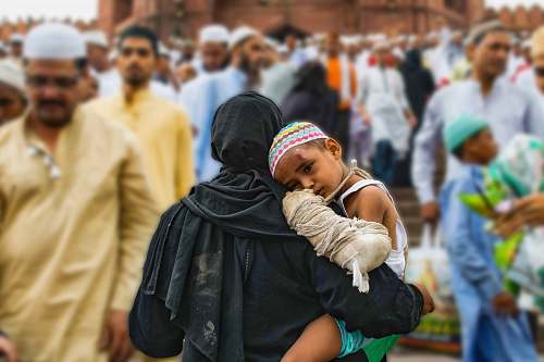 human woman holding a boy people