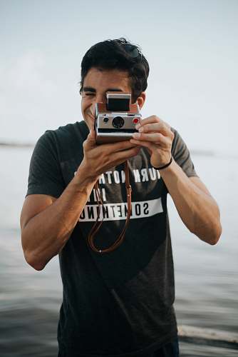 human man taking photo person