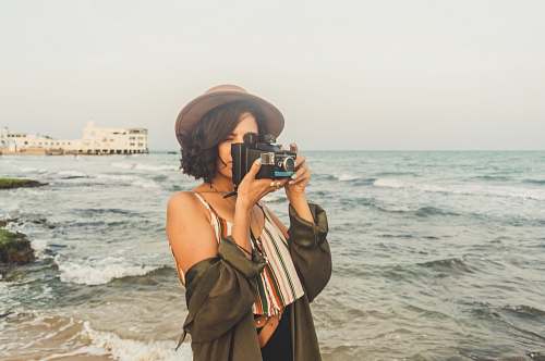 human woman taking photo person