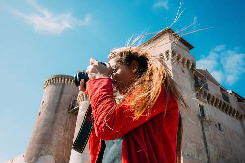 architecture woman with DSLR camera building