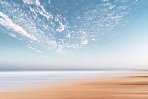 sky time lapsed photography of cumulus clouds sand