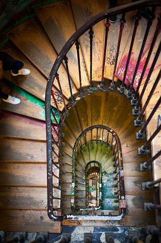 paris black metal framed brown wooden spiral ladder stair