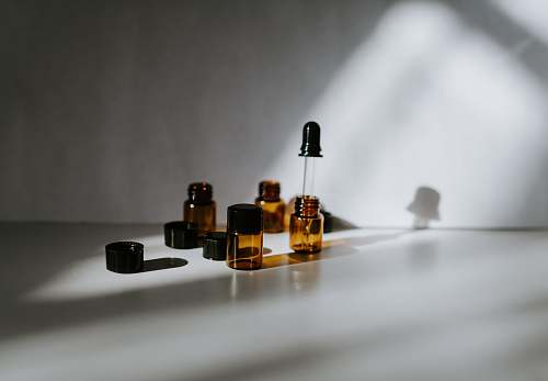 test empty amber glass bottles hold