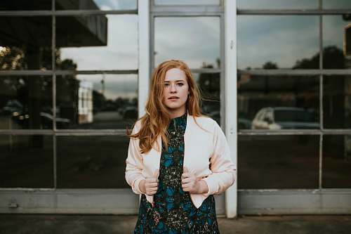 human woman holding her jacket person