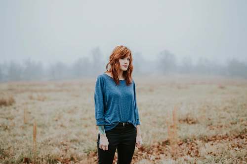 person woman standing during daytime photo human