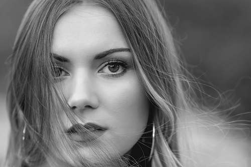 person grayscale photography unknown celebrity face