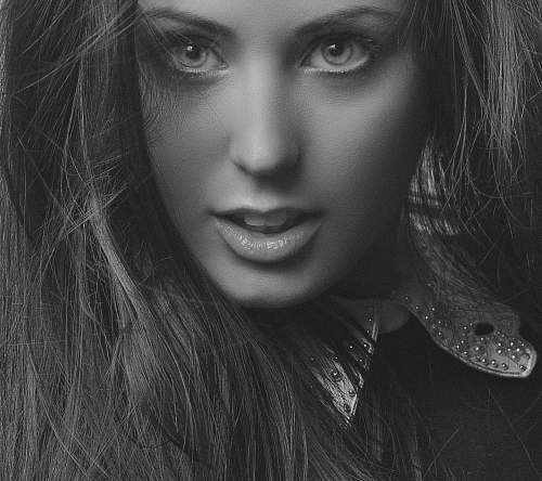 face greyscale photo of woman human