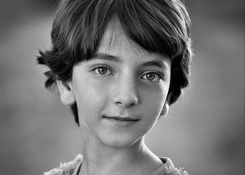 human selective focus photography of boy during daytime face