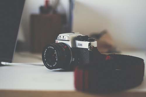 photo black and gray DSLR camera grey