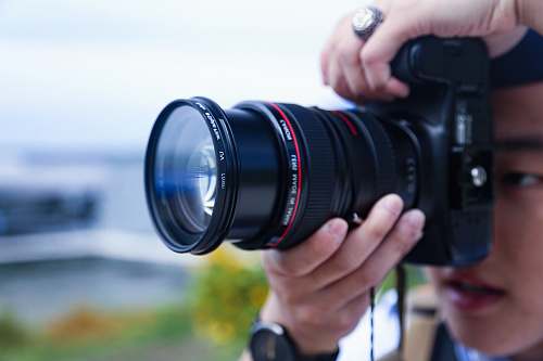 electronics black DSLR camera camera