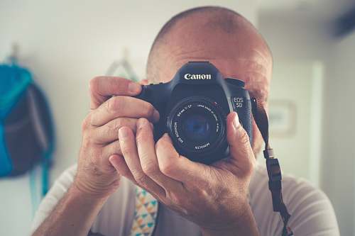 person man taking photo camera