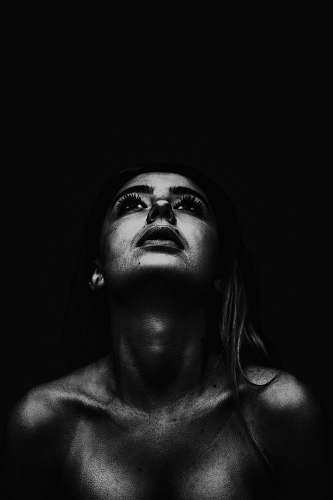 person woman looking up black-and-white