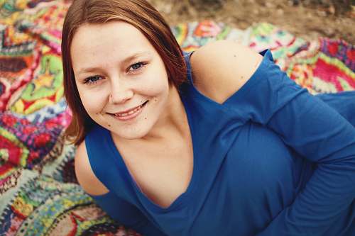 person woman lying on textile face