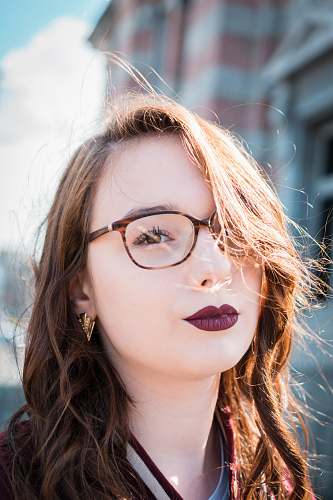 face woman wearing black eyeglasses glasses
