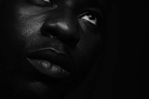 black-and-white close-up photography of human face face