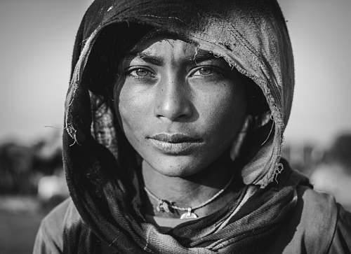 black-and-white grayscale photography of woman wearing hijab face