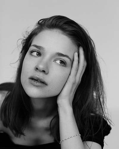 black-and-white grayscale selfie of woman face