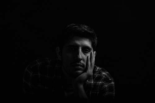 black-and-white greyscale photo of man face