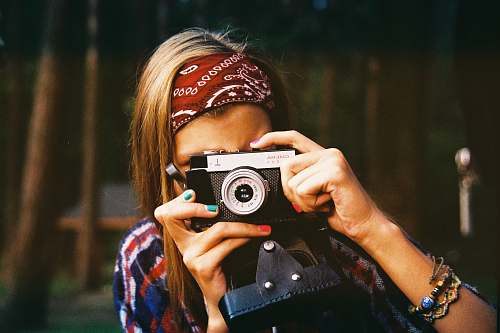 people woman holding camera woman