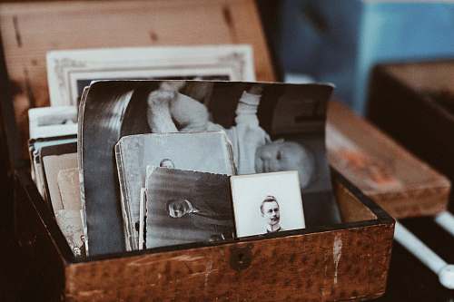 vintage old photos in brown wooden chest pictures