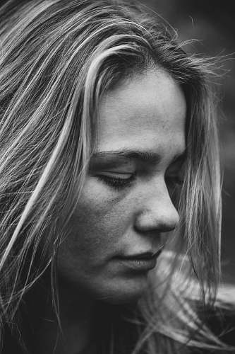 girl grayscale photography of woman glancing her right side black-and-white