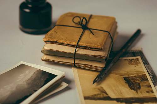 vintage brown paper and black pen photos