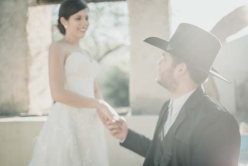 apparel wedding couple on focus photography hat