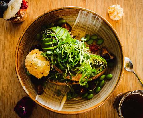 plant green beans and vegetable salad on brown bowl vegetable