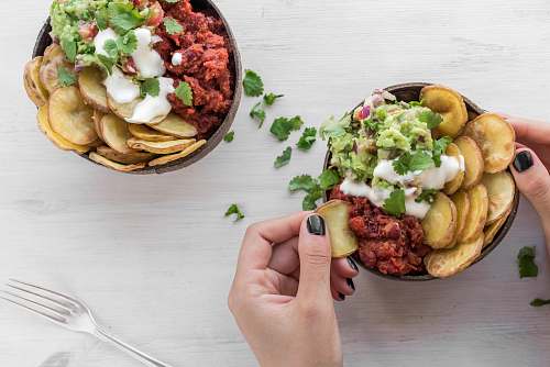 bowl person eating vegetable dish meal